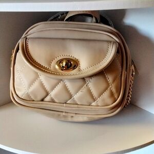 Cream color purse over the shoulder crossbody